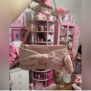 Juicy couture, pink diamond tied with a bow shoulder bag